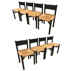 Charlotte Perriand Exceptional Set of Eight Black Model "Meribel" Rush Chairs