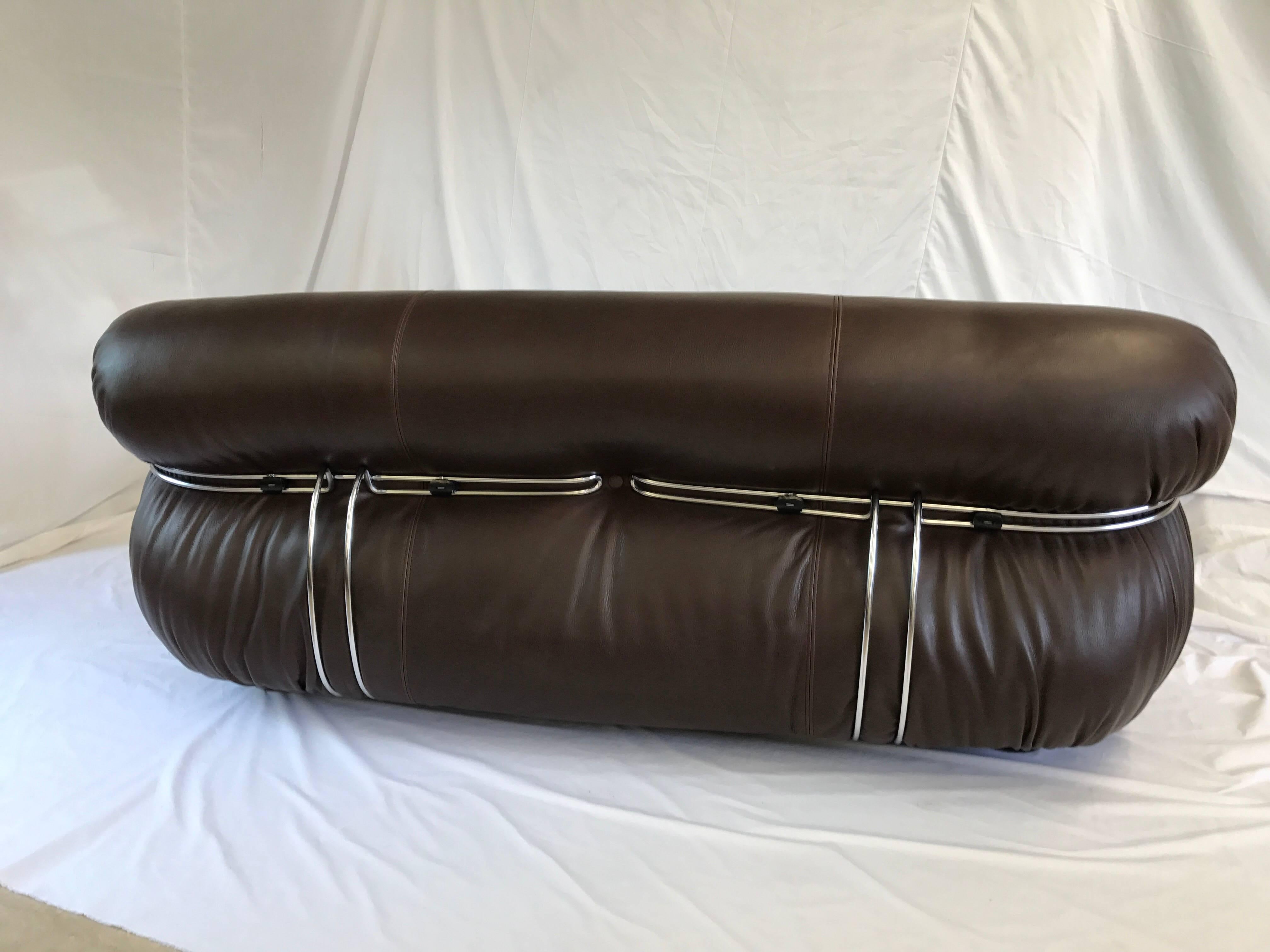 Soriana Sofa design Tobia Scarpa 1970s manufactured by Cassina. This medium version sofa with two front metal clamps will be sold with brand new leather or velvet upholstery.  The leather we use is a full natural leather of the highest quality