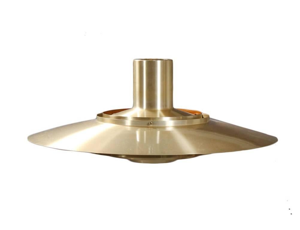 Produced by Nordisk Solar Company in Denmark, designed 1963.
Measurements: H 28,5 cm, diameter: 70 cm.
Material: Brass.

Shipping services: Ask for our competitive shipping quotes.
