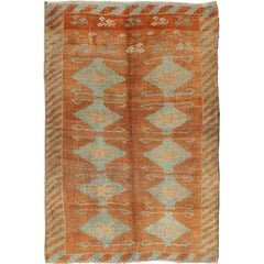 Antique Turkish Tulu Rug with Tribal Medallions in Copper and Light Blue green