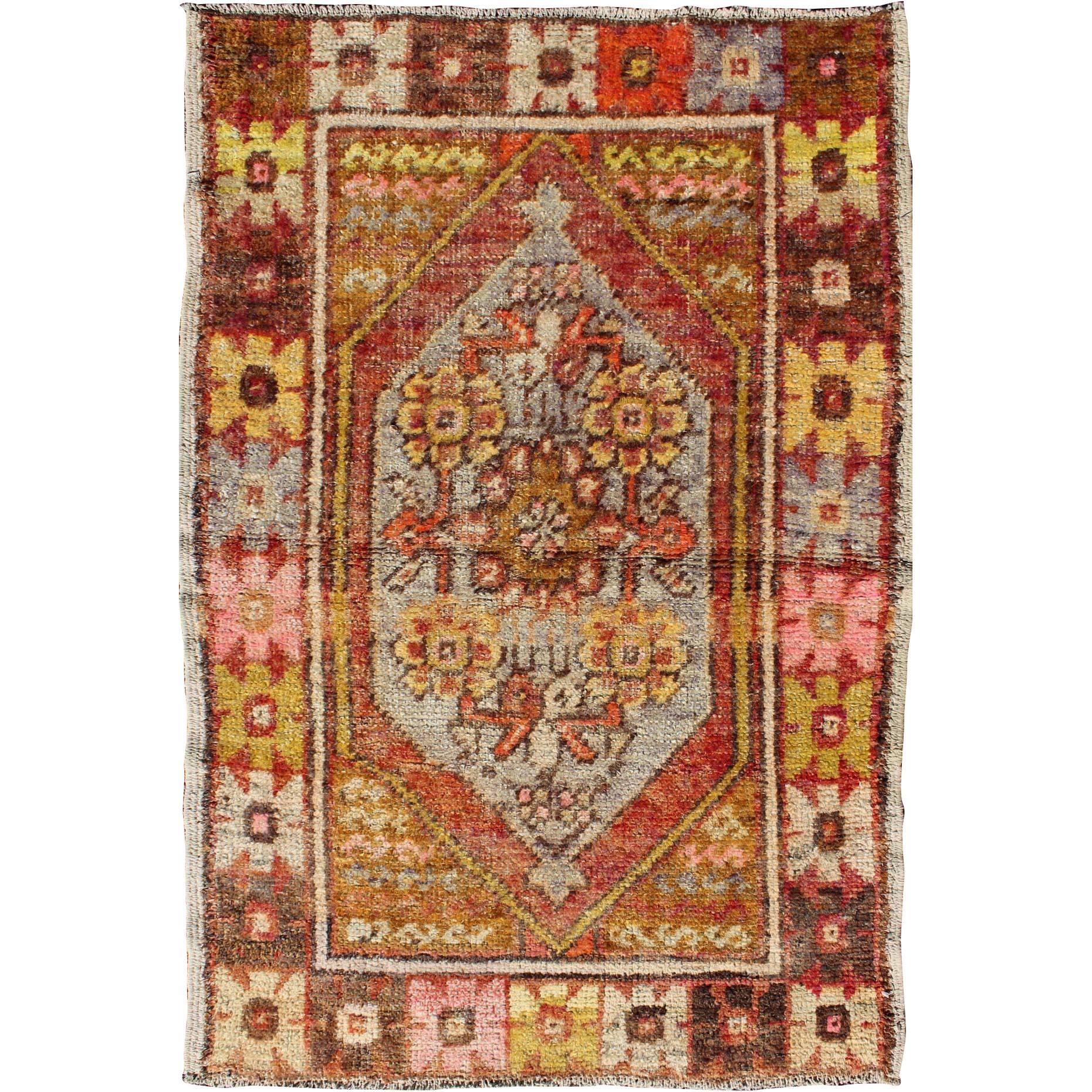 Colorful Vintage Turkish Small Oushak With Floral Medallion and Border For Sale