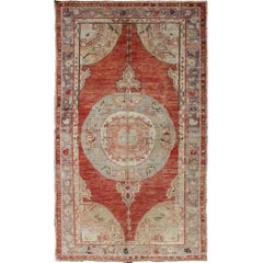 Vintage Turkish Oushak Rug with Rounded Medallion and Cornices in Red and Gray Vintage Turkish Oushak Rug with Rounded Medallion and Cornices in Red and Gray