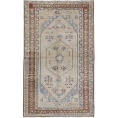 Vintage Turkish Oushak Rug with Tribal Motifs and Medallion