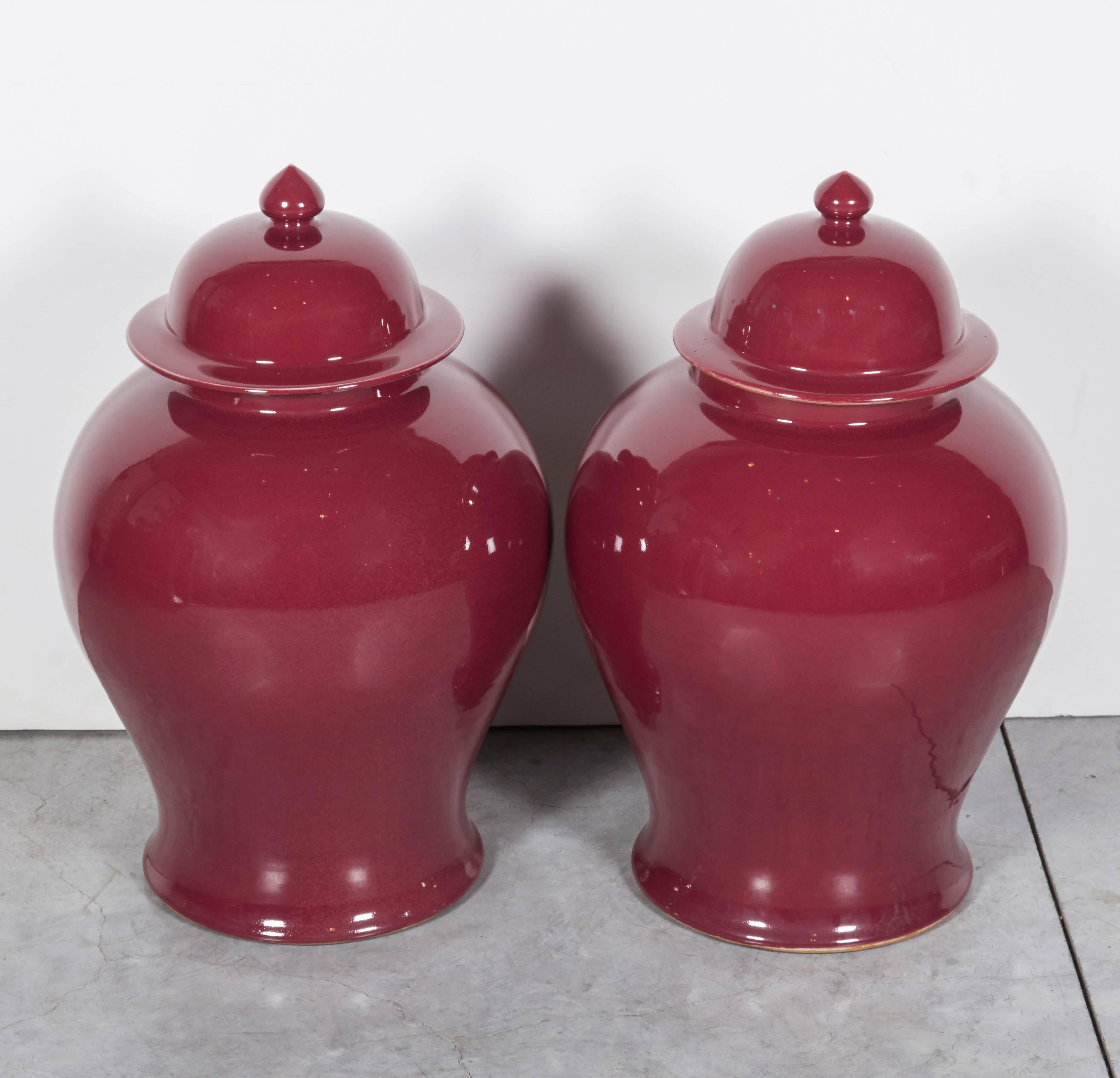 Two brightly glazed, classically shaped, covered contemporary Chinese baluster jars. These heavy ceramic pieces add a great splash of color and style to any room. Sold individually.
CR101b.
