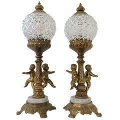 Vintage Pair of French Style Bronze Ormolu and Marble Putti Electrified Oil Lamps