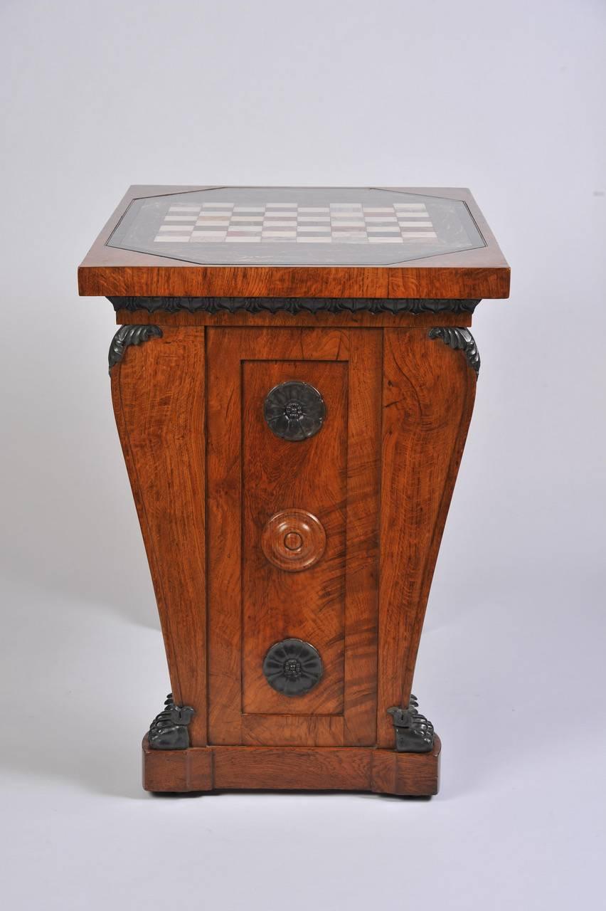 Attributable to George Bullock with design features similar to a table of Thomas Hope, illustrated in the book on “Thomas Hope by David Watkin” pl 98, page 227, and now in the Ashmolean Museum in Oxford.
A wonderful pollard oak chess table with