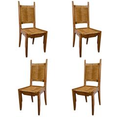 A Mid Century Set of Four Guillerme & Chambron Chairs