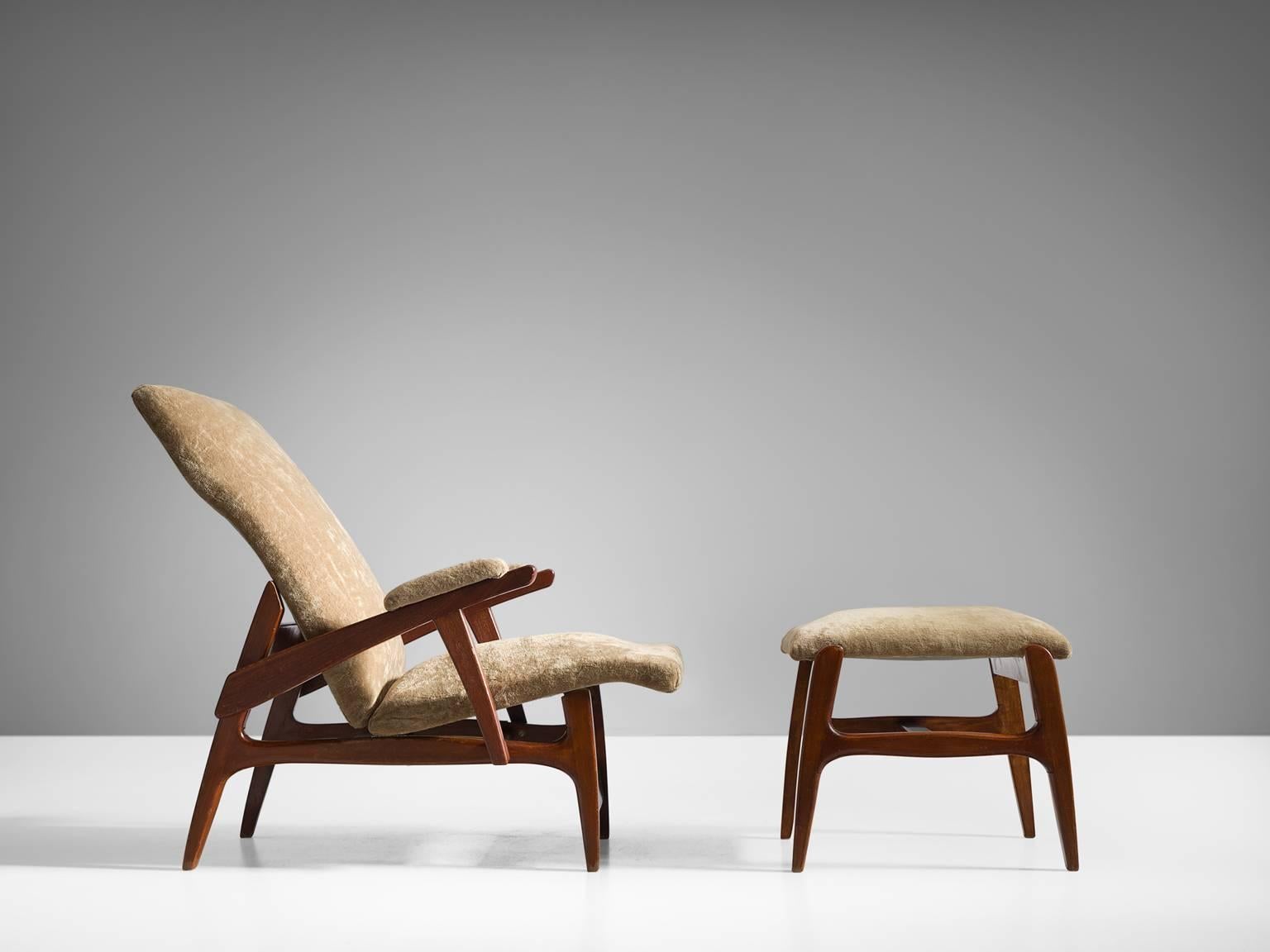 Lounge chairs with stool, suede and wood, France, 1950s

This sculptural France easy chair is both aesthetically challenging and original. The frame features wonderful curved finished and angles. The chair is truly comfortable through by means of