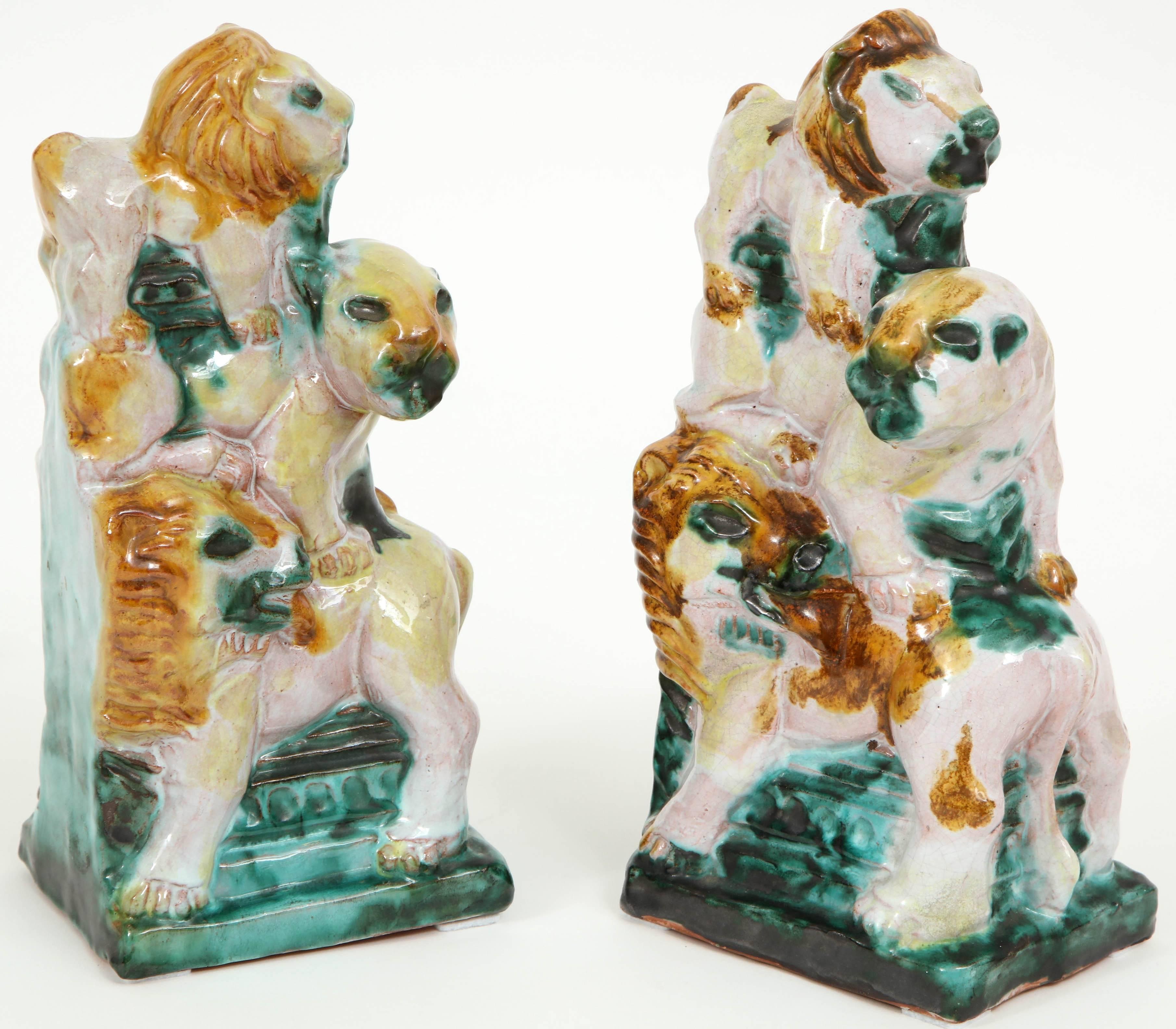 Exceptional early 20th century earthenware bookends in the style of Wiener Werkstatte of stacked Lions. Both beautifully sculptural and functional these unique period pieces have those rich colors similar to Vally Wieselthier. 
Signed, Made in