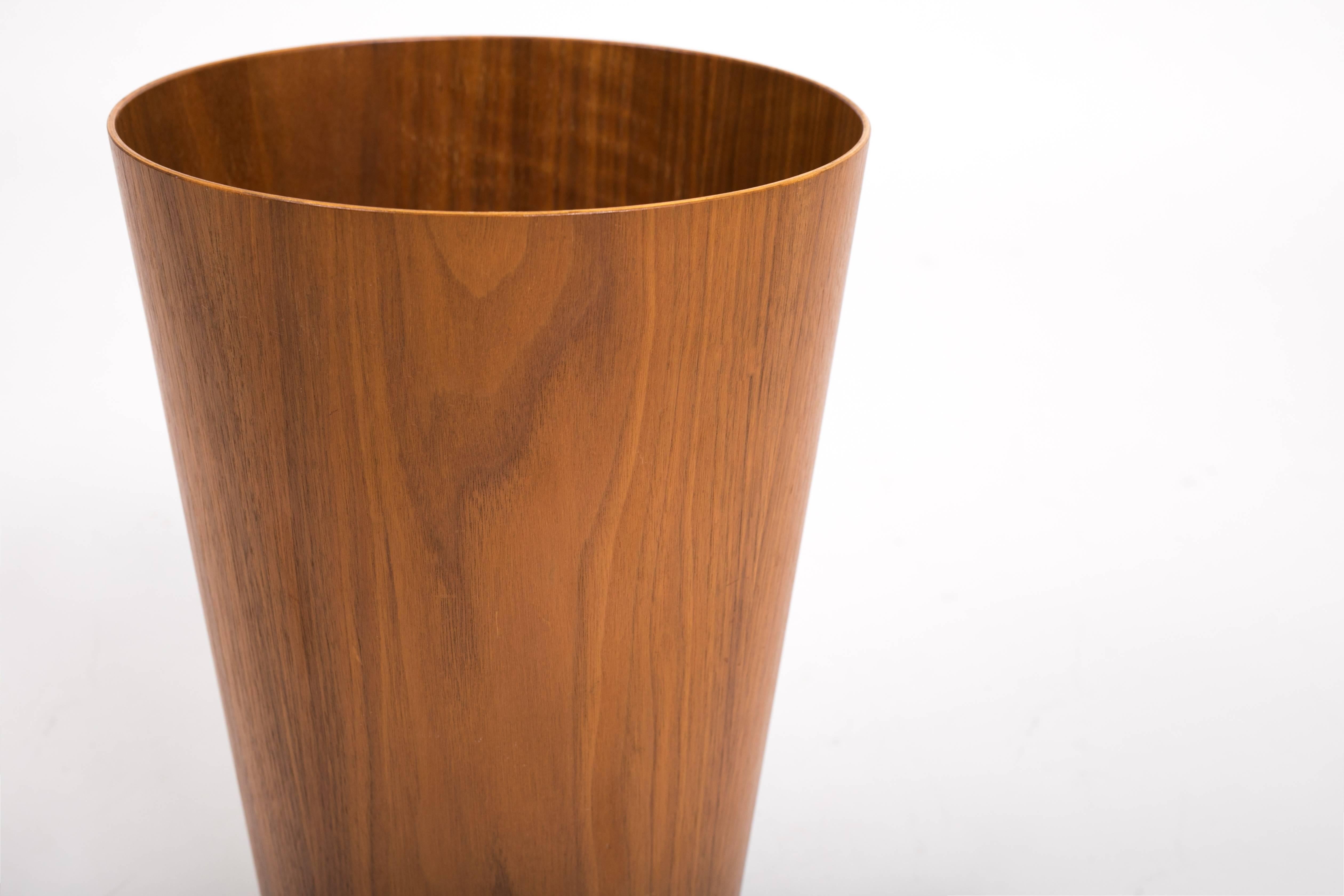 Swedish design house servex/rainbow wood products specialized in streamlined home and office accessories in teak veneer. Designed by Martin Åberg, this teak waste-paper basket has a delicately flared conical shape and interior in teak veneer. This