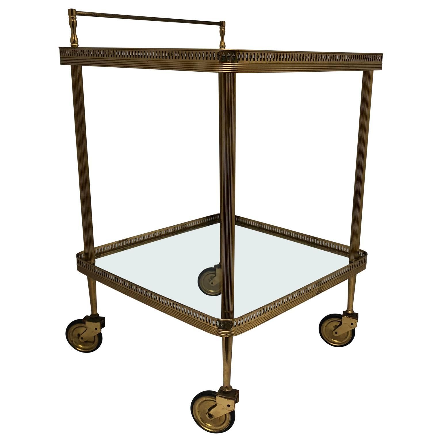 Italian Mid-Century Modern square brass bar cart
Two-tier.
$125 flat rate front door delivery includes Washington DC metro, Baltimore and Philadelphia