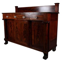 Antique American Empire Carved and Bookmatched Flame Mahogany Sideboard, 19th Century