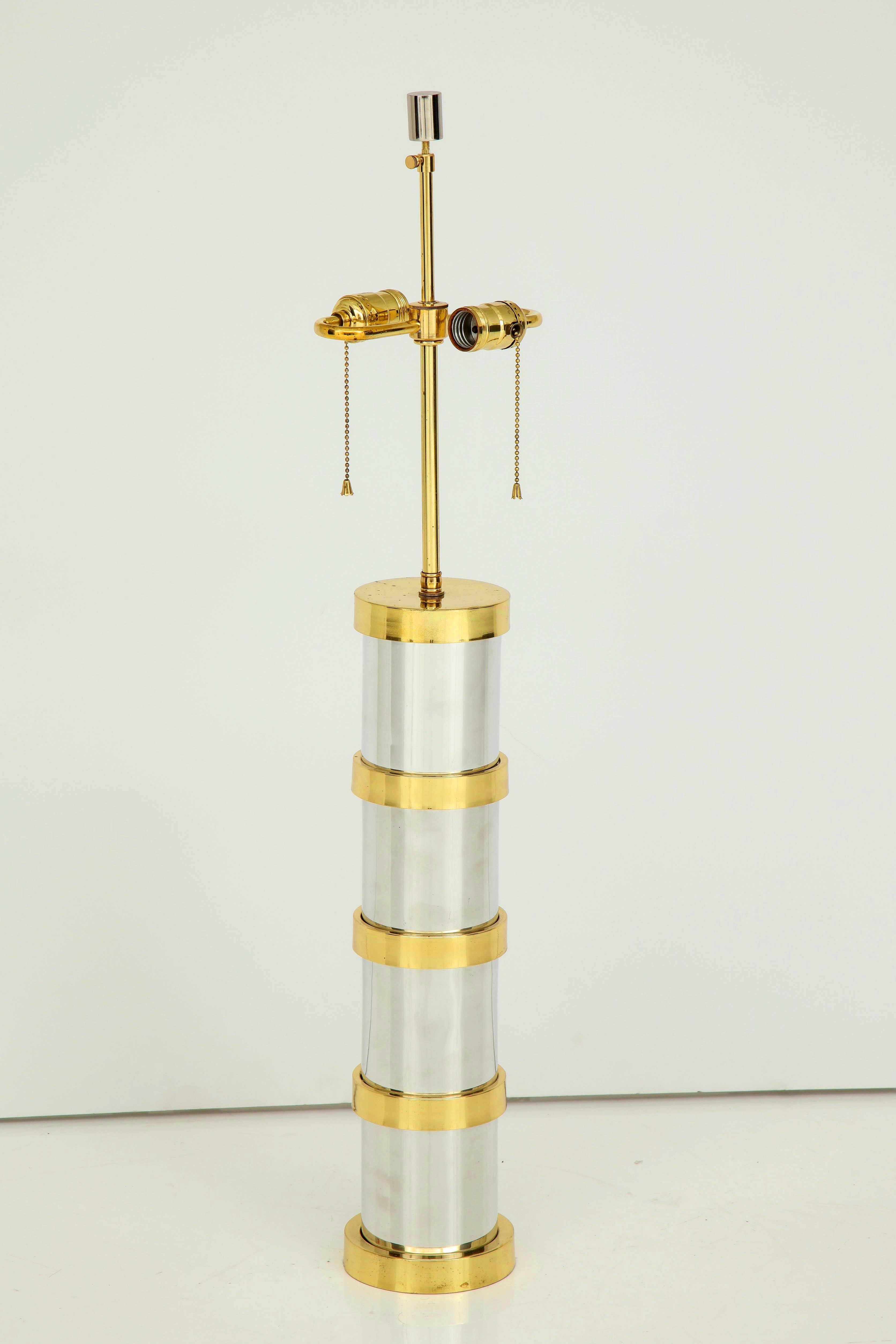 Beautiful brass and chrome round table lamp with alternating bands of brass and chrome. Perfect period statement piece for desk, console or foyer table. Unsigned. 