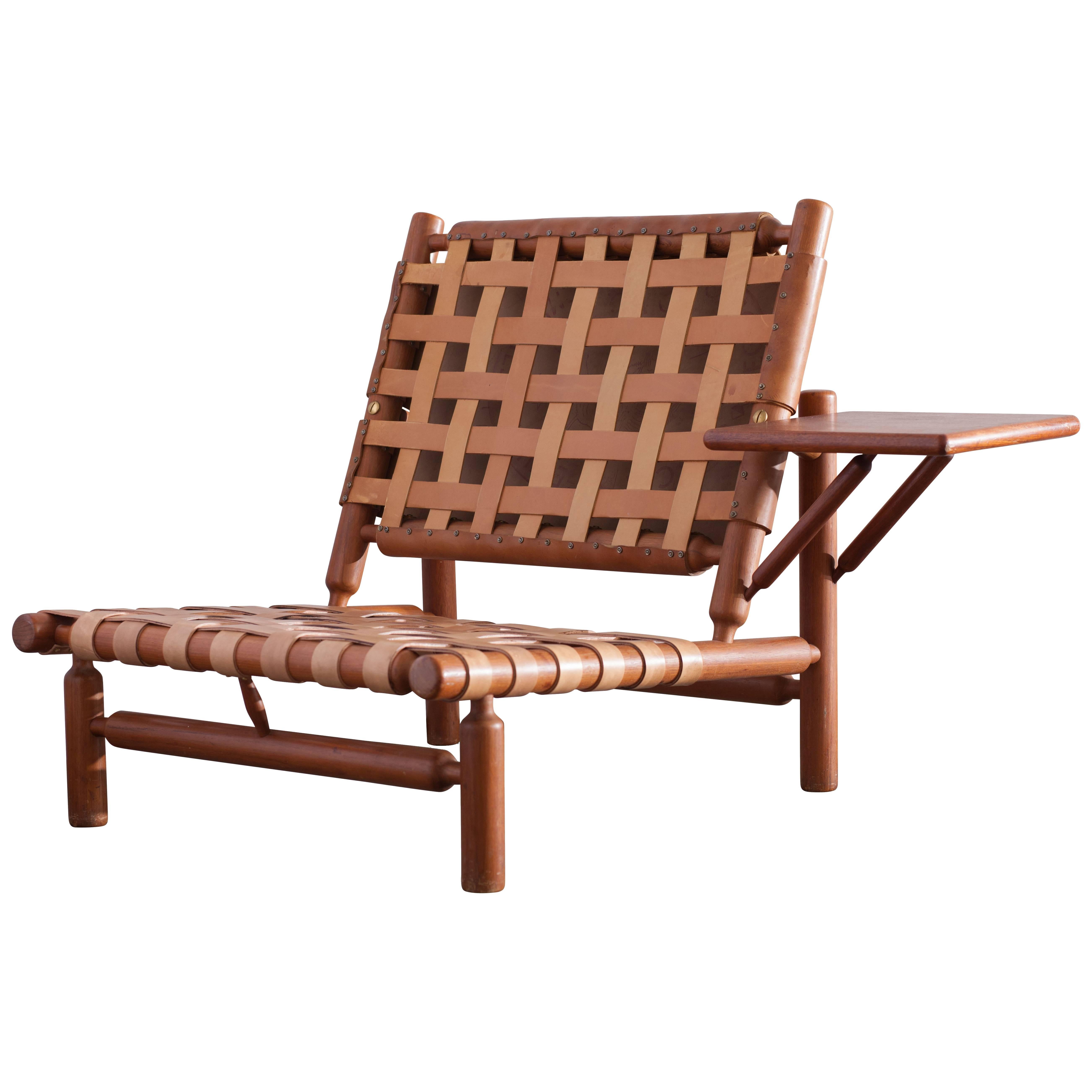 Ilmari Tapiovaara Patined Cognac Lounge Chair with Ottoman