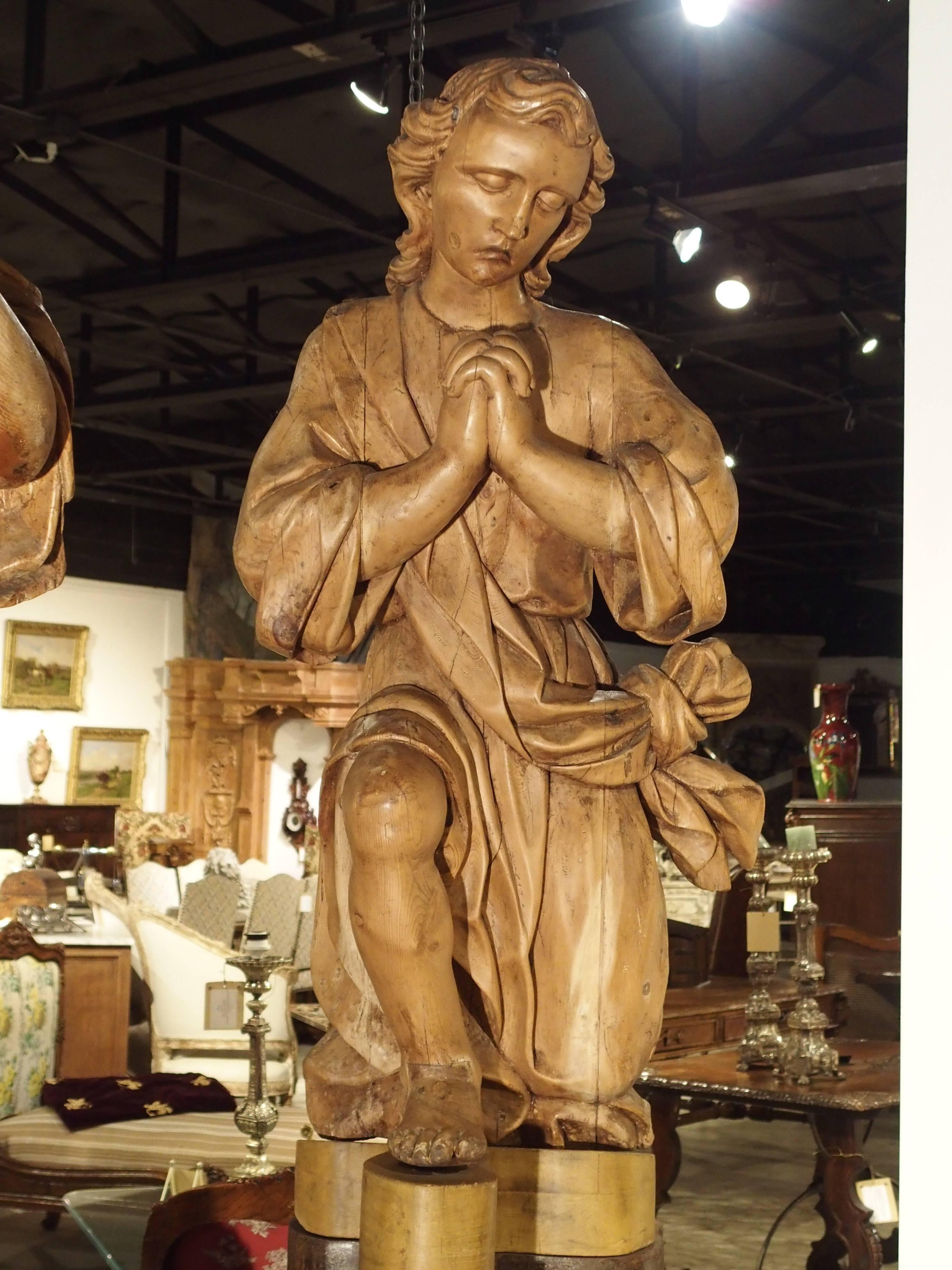 Magnificent Pair of Antique Carved Pine Angels on Iron Bases, circa 1710 In Good Condition In Dallas, TX