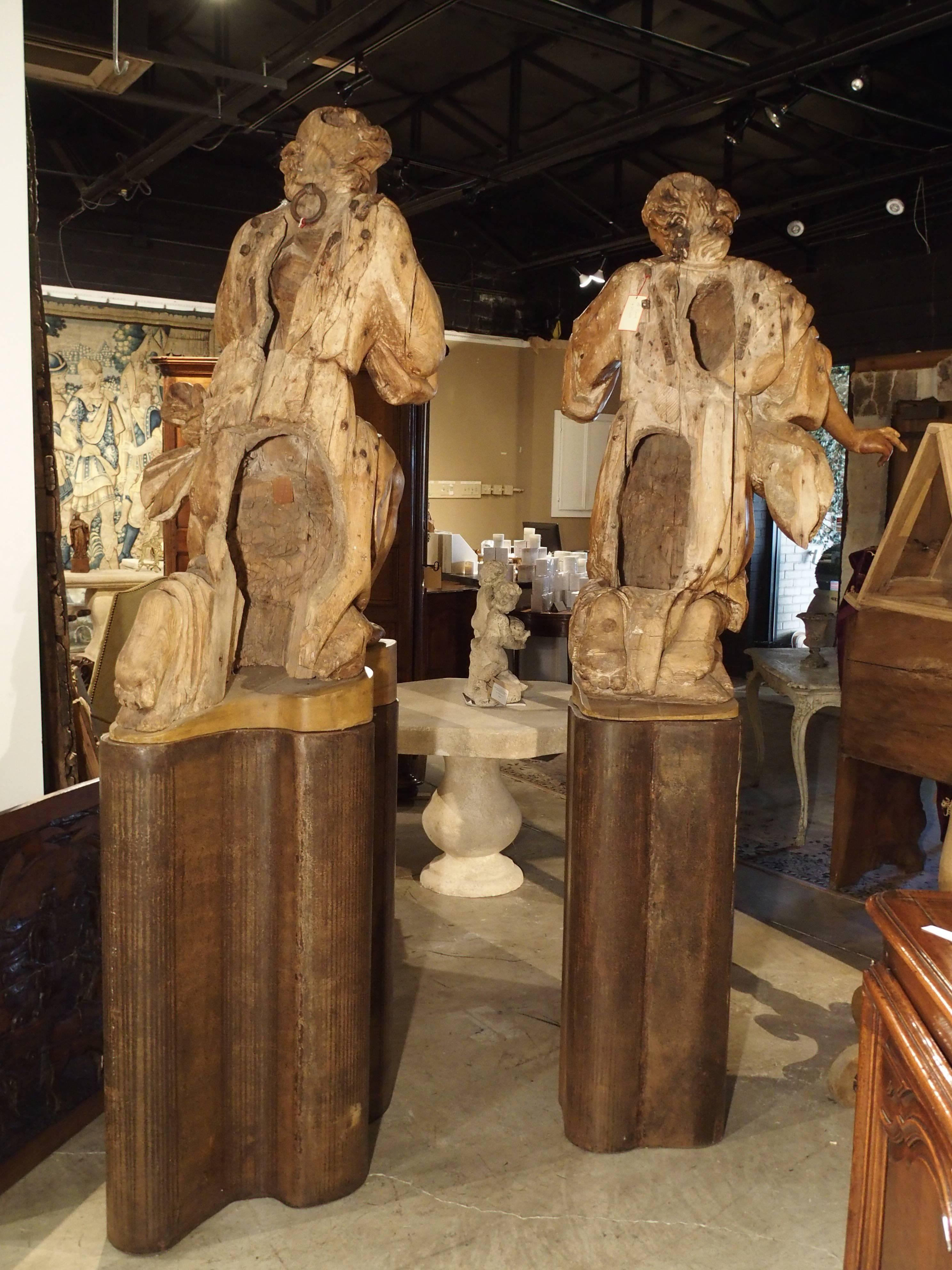 Magnificent Pair of Antique Carved Pine Angels on Iron Bases, circa 1710 1