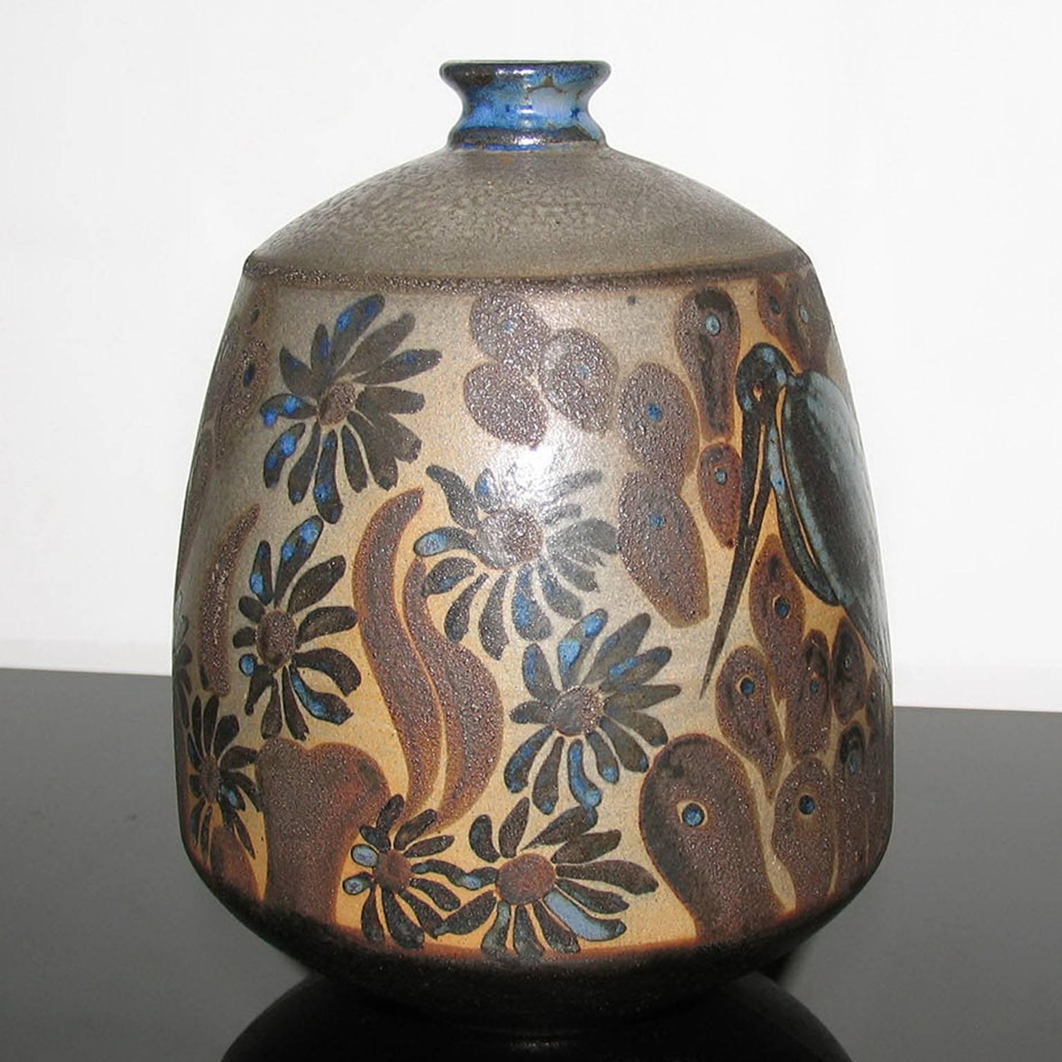 A superb example of Art Deco craftsmanship in France, produced by one of the world's finest workshops Primavera (Ateliers d'Art des magasins du Printemps), simila model exhibited at Autumn Salon in Paris, 1921. Poly-chrome enameled stoneware vase