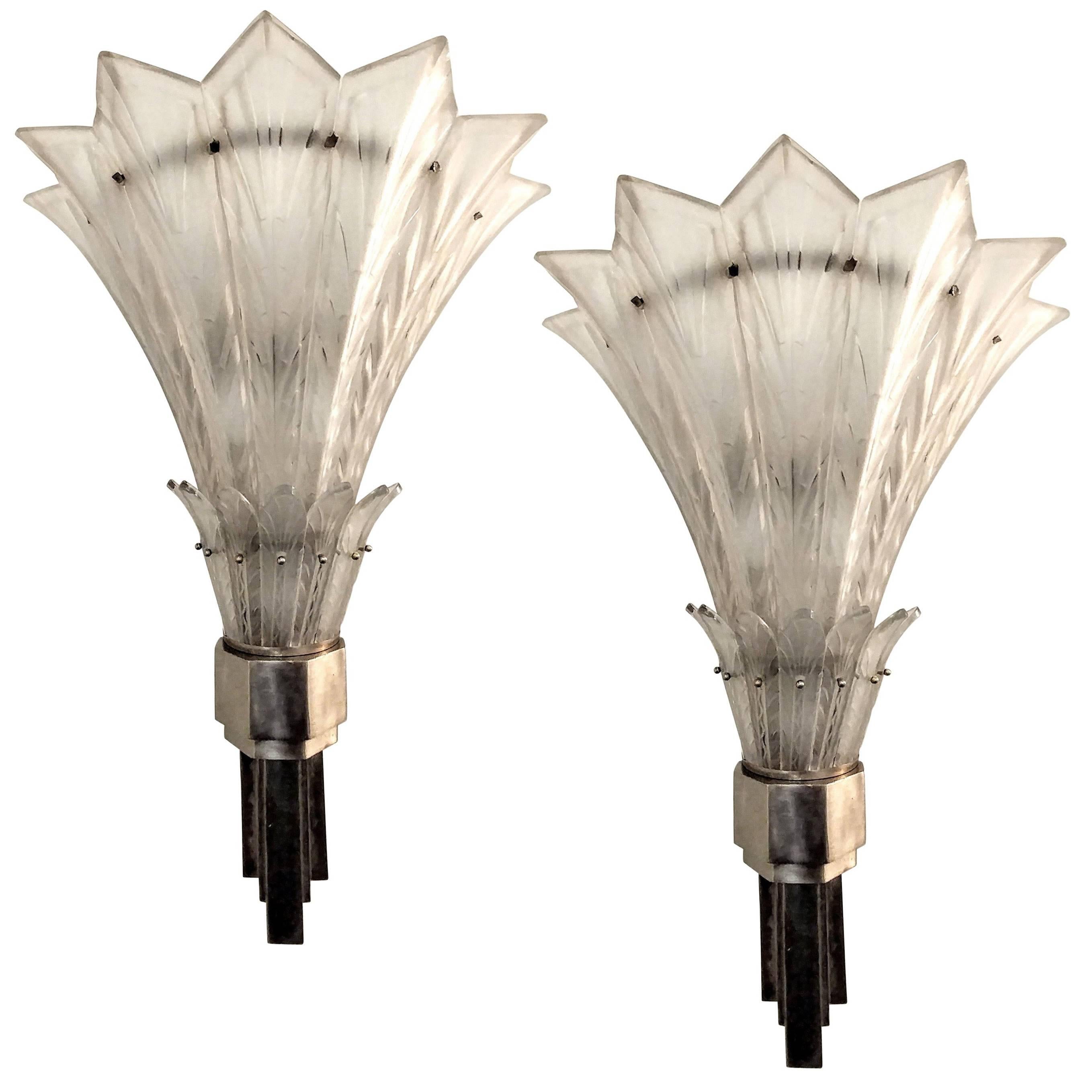 A single French Art Deco rare two-tier wall sconce was created in the 1930's by 
