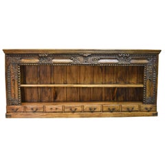 20th Century Long Open Asian Bookcase in Teak with Carved Foliage and Flowers