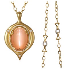 Divine Glowing Cat's Eye Peach Moonstone White Diamond Gold Amulet Necklace
