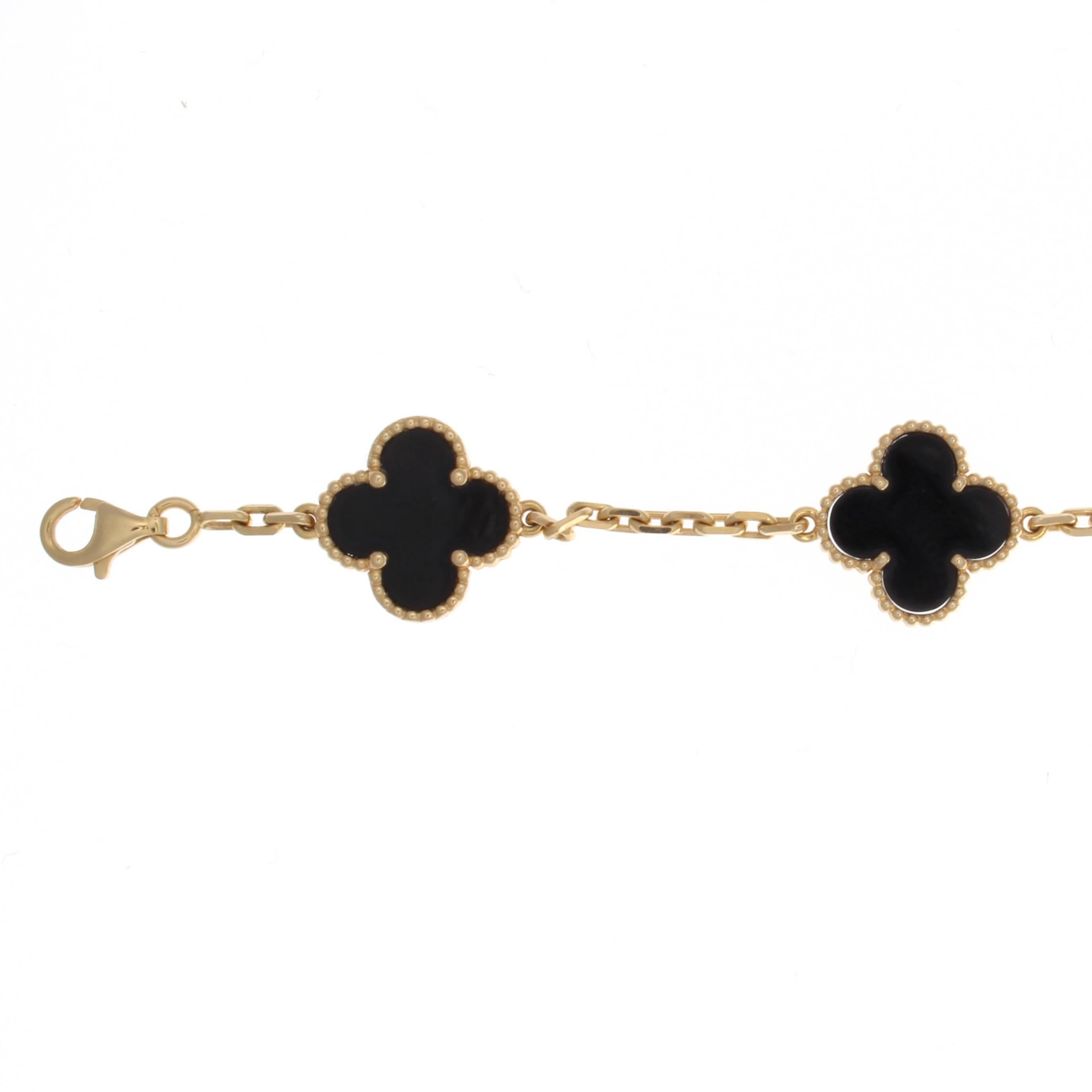 The always desirable and popular Alhambra collection from VCA. This bracelet has been designed with 5 jet black onyx motifs and 18k yellow gold. 

Signed VCA and numbered.