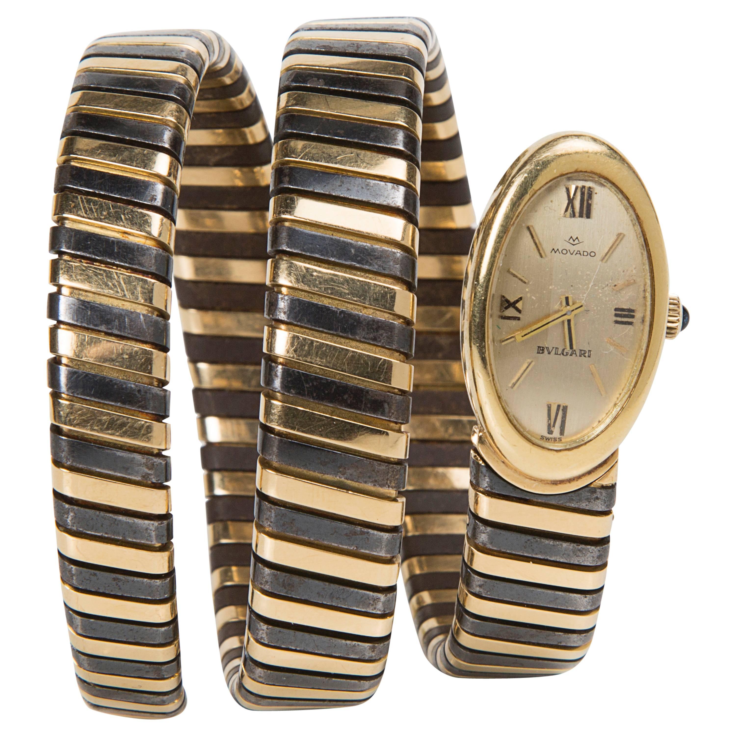 1960s Bulgari Lady's Yellow Gold Stainless Steel Tubogas Serpenti Wristwatch For Sale