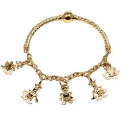 Pomellato Gold Charm Bangle Bracelet