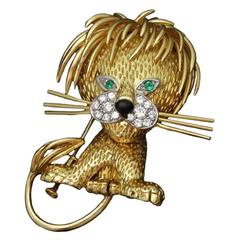 1960s Van Cleef and Arpels Diamond Gold and Platinum Lion Brooch