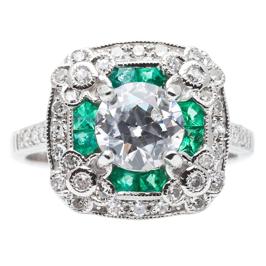 European Cut 1.02 Carat Diamond Emerald Platinum Floral Engagement Ring For Sale