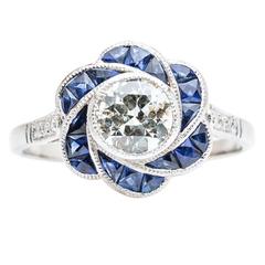 Flower Shape Sapphire and Diamond Engagement Ring in Platinum
