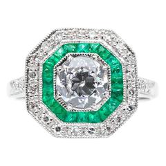 Double Halo 0.80 Carat Diamond and Emerald Ring 