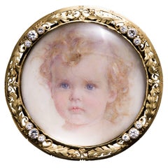 Edward Oakes Art Nouveau Portrait of a Child Brooch in Gold