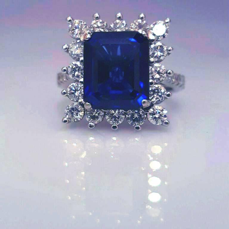 1 Sap= 6.88ct gorgeous ceylon sapphire vivid blue color vs1 clarity. 
Dia = 1.00ct    VVs clarity F color conflict free, natural white diamonds.