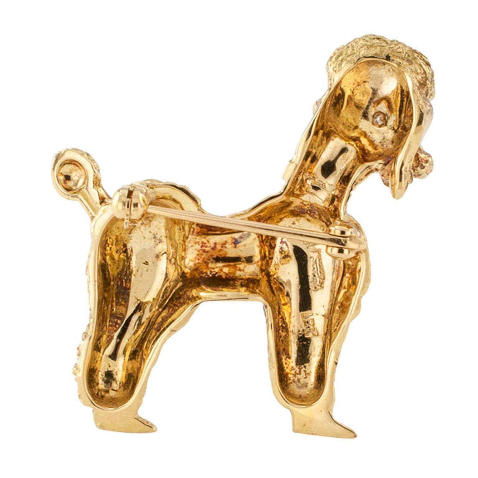 Gold and Diamond Poodle Brooch Circa 1950

Perfectly groomed and poised... with a genuine sparkle in the eyes... a real charmer. And you can take it out for a walk and the only things you'll be picking up is compliments. How wonderful is that? Mid
