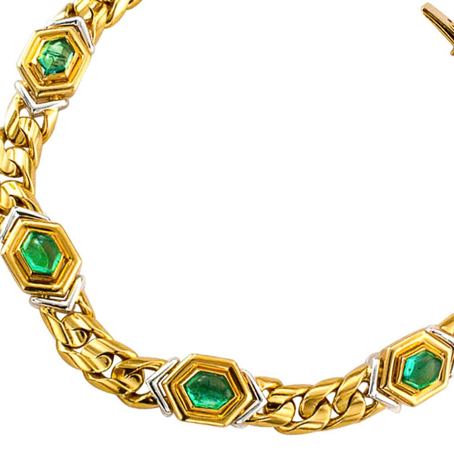 Bvlgari Estate Emerald Gold and Platinum Link Bracelet

In a manner that is distinctly BVLGARI, 18-karat gold and platinum engage in a courtship with six kite-shaped emerald cabochons totaling approximately 3.00 carats.  Delightful... beautiful