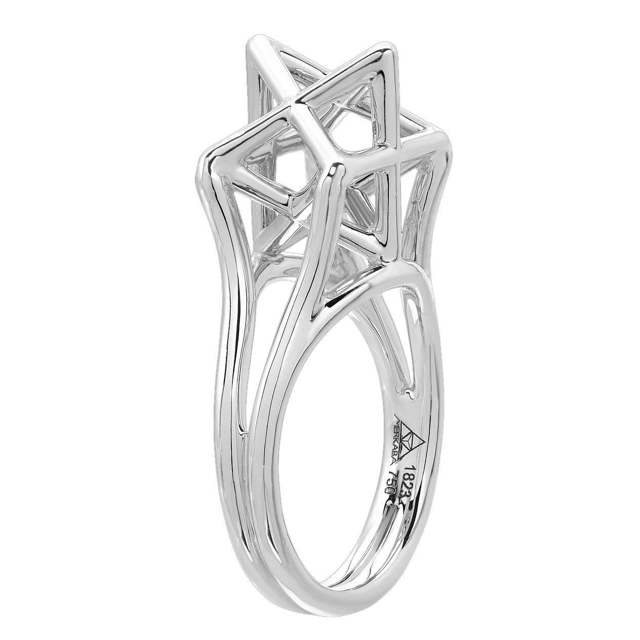 Merkaba star platinum ring, featuring a dramatic, three dimensional sculptural design extending upward from the hand, 0.43 inches.
Size 6. Can be sized to fit. 
*Each piece comes with a certificate of authenticity and unique serial number.
*Made by