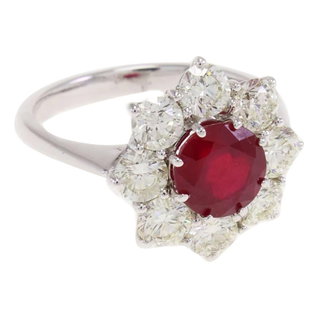 ct 2, 20 Ruby and ct 2, 02 Diamond Flower Ring