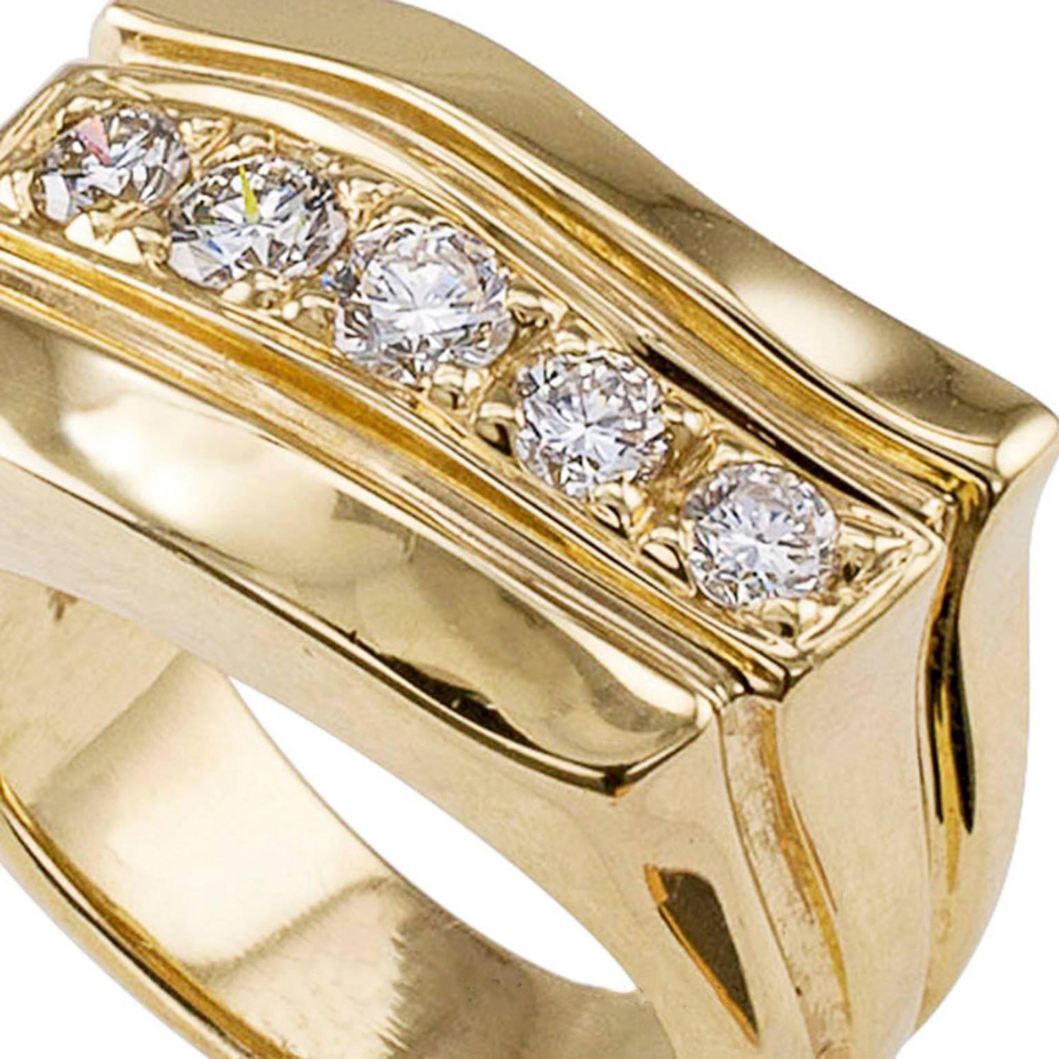 Rigoberto Diamond Gold Ring

Rigoberto 14 karat gold and diamond Tango ring from the Aventura Collection.  A gentle curve traverses the undulating design highlighted by five graduating round brilliant-cut diamonds totaling approximately 0.60 carat,