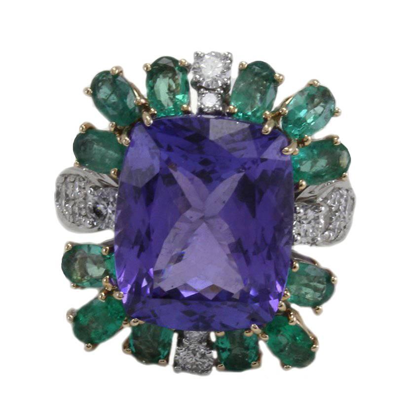 Ct 14, 07 Tanzanite Ct 2, 55 Emerald and Ct 2, 29 Diamond Two Color Gold Ring