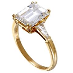 Bague de fiançailles en or jaune Boucheron:: diamants baguette effilés et taille émeraude