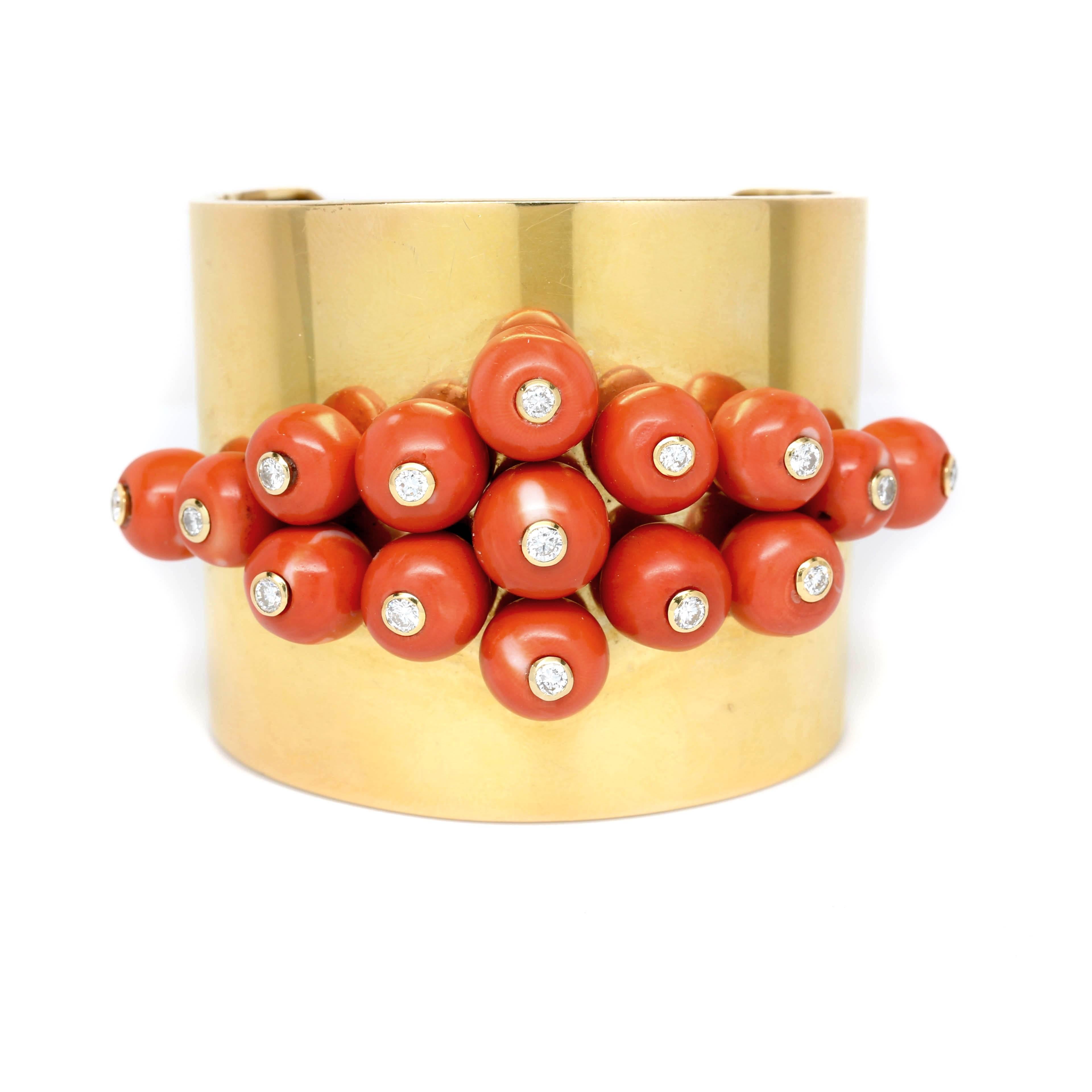 18K Cuff Bracelet made in the 1980s set with 16 Coral Balls and 16 Diamonds equaling Approx. 1.80 Carats