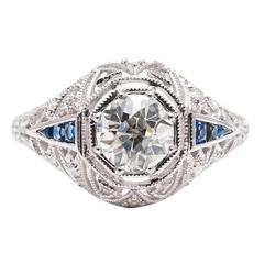 Hand Crafted 1.03 Carat Diamond and Sapphire Engagement Ring