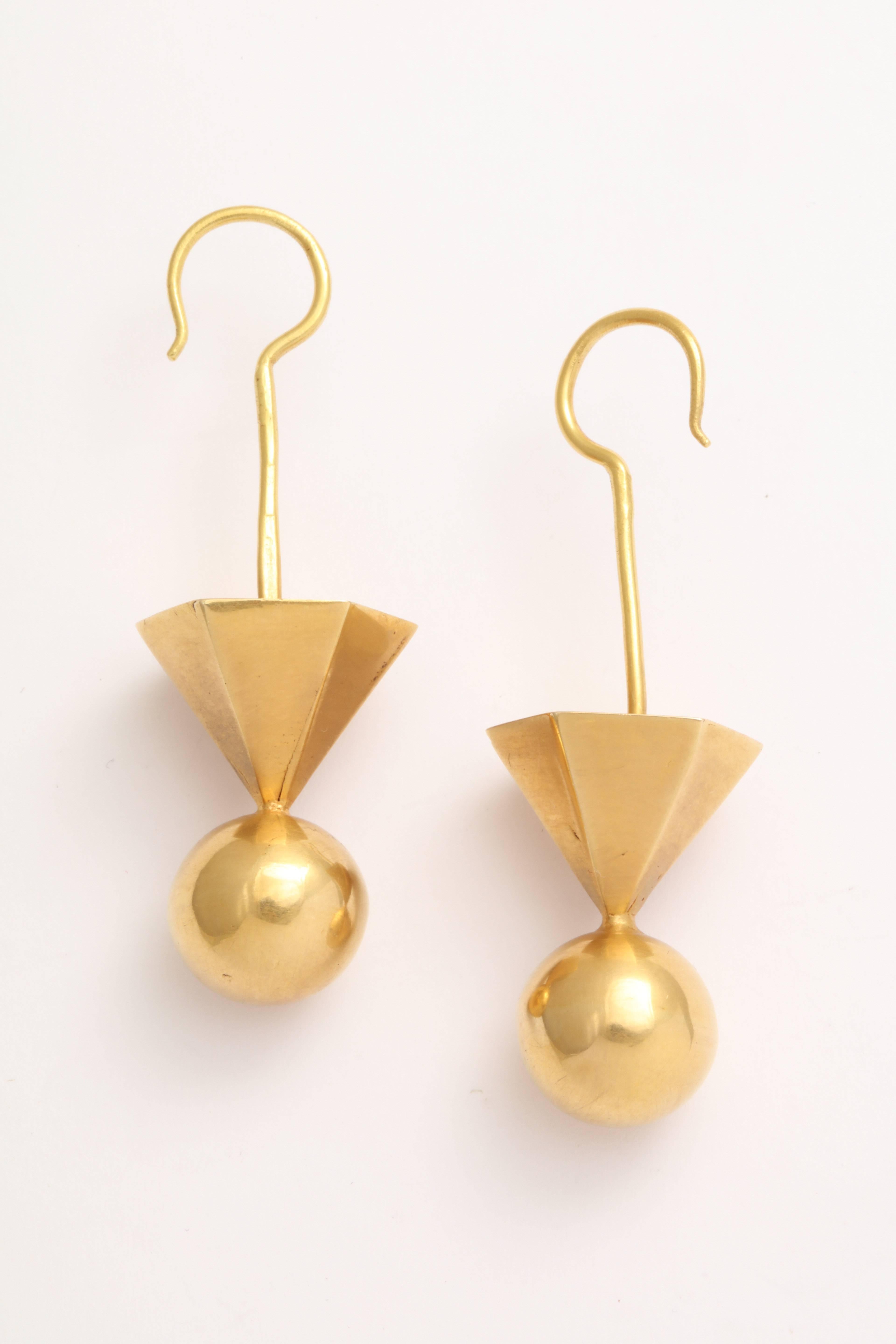 A pair of 18kt yellow gold tribal earrings

Length:2.30 inches
Width: .80 inch