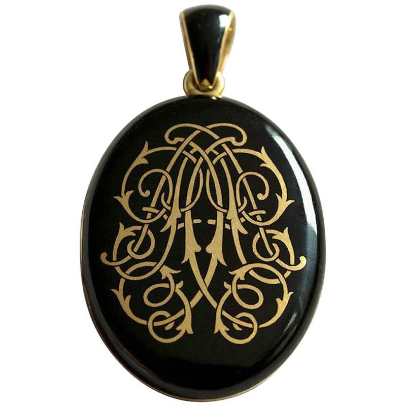 Tiffany 
Co. Antique Victorian Black Enamel and Gold Locket