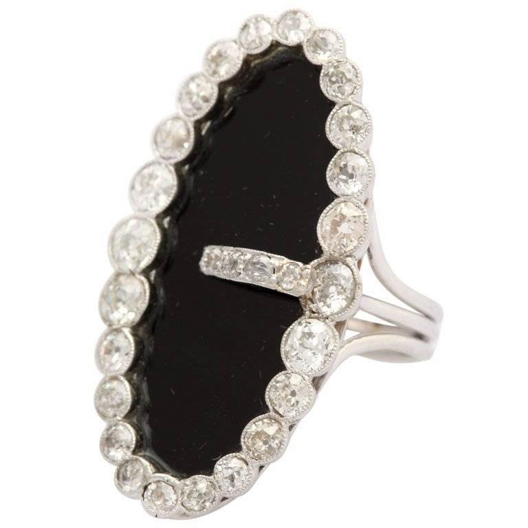 Early 20th Century Onyx and Diamond Buckle Cocktail Ring