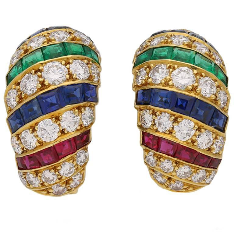 Cartier vintage ruby, sapphire, emerald and diamond earrings, circa 1978. For Sale