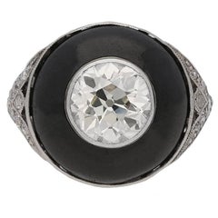 Art Deco diamond and black enamel ring, circa 1925.
