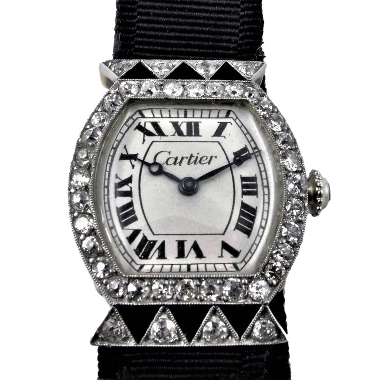 Cartier Art Deco Tortue Platinum and Rose Gold Vintage 1920s Diamond Wristwatch For Sale at 1stdibs