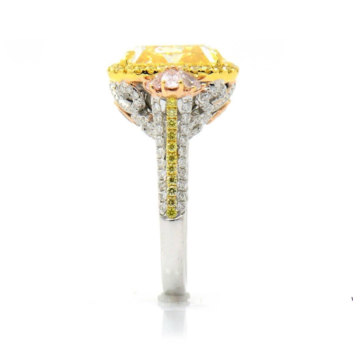 FANCY YELLOW AND PINK DIAMOND RING - 12.77 CT

Set in 18Kt White gold


Total fancy yellow diamond weight: 12.07 ct


[ 1 diamond ]


Color: Natural fancy light yellow


Clarity: VS2


Total ring weight: 11.04 grams


GIA Certified