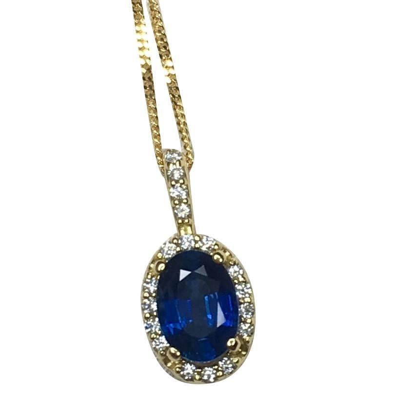 Ceylon 1.00 Carat Blue Sapphire and Diamond 18 Karat Gold Cluster/Halo Pendant